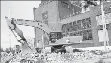  ??  ?? DAVID JACOBS/SDG Newspapers Here is a closer look at the demolition site as shown earlier this year. Page Demolition and Excavating of Lucas, Ohio led the effort to demolish the building structures.