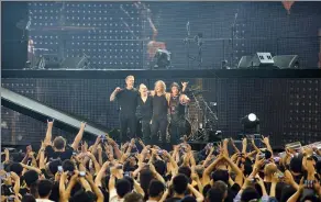  ?? PHOTOS BY LIU BING / FOR CHINA DAILY ?? Metallica’s China debut in Shanghai in 2013 drew more than 20,000 fans.