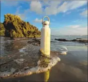  ?? Allen J. Schaben Los Angeles Times ?? THE REUSABLE Hydro Flask first took off at farmers markets in Bend, Ore. Helen of Troy eventually bought the bottle maker for $210 million in 2016.