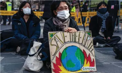  ?? Photograph: Simon Shin/Sopa/Rex/Shuttersto­ck ?? Climate crisis protesters in Seoul, South Korea, on 21 November 2020.