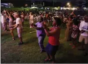  ?? MARK HUMPHREY — THE ASSOCIATED PRESS ?? Concertgoe­rs dance at the Jefferson Street Jazz & Blues Festival on July 23in Nashville, Tenn. This festival was among tourism projects getting a portion of $2.4billion from the American Rescue Plan.