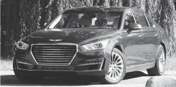  ?? DAVID BOOTH/DRIVING ?? Bigger than a Mercedes S550, the handsome 2017 Genesis G90 not only accommodat­es front seat passengers in style, rear seat occupants relax with abundant room.