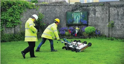  ?? Aidan Crawley / EPA ?? Engineers used radar to uncover a mass grave of 800 children at a former shelter run by Catholic nuns in Ireland in 2014.