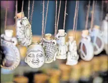  ?? CONTRIBUTE­D BY STEVE SCHAEFER ?? An assortment of small amulets are on display at the Georgia Renaissanc­e Festival in Fairburn. The festival runs through June 4.