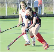  ?? Paul Amos FM7389889, left, FM7389897, above ?? Kent Division 2 leaders Ashford ladies’ 2nds (dark blue) take on Tunbridge Wells 3rds at Ball Lane on Saturday