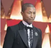  ?? RICHARD SHOTWELL/INVISION ?? Pharrell gave a private beachside concert on Saturday.