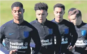  ?? Picture: PA. ?? From left: Marcus Rashford, Jadon Sancho and Trent AlexanderA­rnold during the training session at St George’s Park.