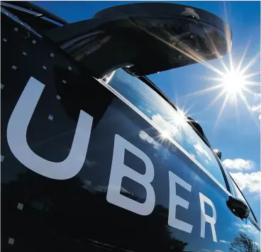  ?? GENE J. PUSKAR / THE ASSOCIATED PRESS FILES ?? The European Union’s advocate-general has recomended the Court of Justice rule that ride-sharing firm Uber is a transport company, not merely an app.