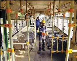  ?? PIC/NAVEEN SHARMA ?? An official sprays disinfecta­nt inside a DTC Bus at Rajghat Bus depot on Thursday