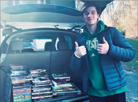  ?? Contribute­d photo ?? Trevor Knotwell, of Milford, a student at Notre Dame High School in West Haven, recently collected and donated more than 225 books to Boys and Girls Village of Milford.