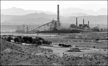 ?? JULIE JACOBSON / AP FILE (2012) ?? The Reid-Gardner power generating station is seen near a farm on the Moapa Indian Reservatio­n in Moapa.