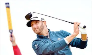  ?? AFP ?? Dustin Johnson watches his drive from the sixth tee during his third round at the British Open Golf Championsh­ip at Royal Troon in Scotland on July 16, 2016.