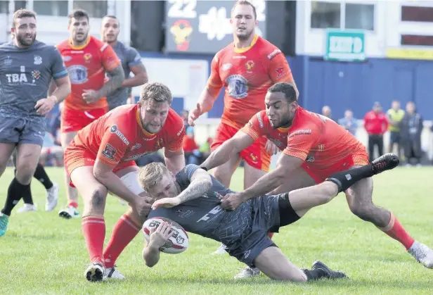  ?? Simon Hall ?? Danny Yates is taken down during Hornets clash against Sheffield Eagles on Sunday