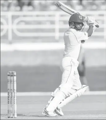  ??  ?? Wicketkeep­er-batsman Shane Dowrich plays stylishly through the off-side during his unbeaten 46 on the opening day of the first Test against Sri Lanka. (Photo courtesy CWI Media)