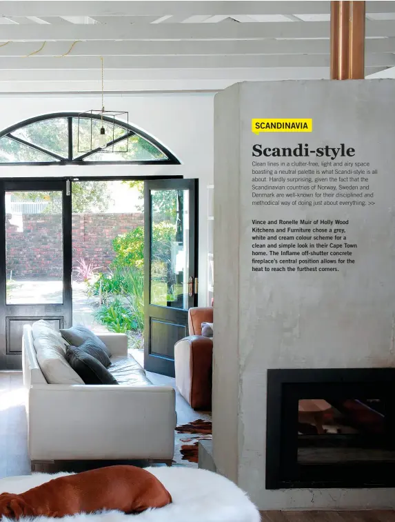  ??  ?? Vince and Ronelle Muir of Holly Wood Kitchens and Furniture chose a grey, white and cream colour scheme for a clean and simple look in their Cape Town home. The Inflame off-shutter concrete fireplace’s central position allows for the heat to reach the furthest corners.