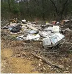  ?? Submitted photo ?? ■ A dump site shows trash in one location in Columbia County, Ark. Statewide a total of 43 illegal dump sites have been removed, according to the Arkansas Agricultur­e Department Law Enforcemen­t Division.