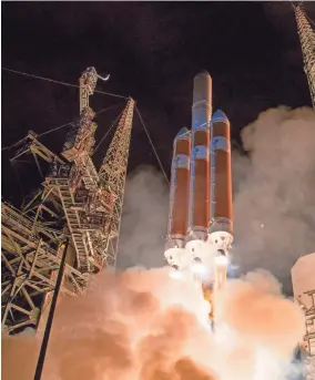  ??  ?? The United Launch Alliance Delta IV Heavy rocket launching NASA’s Parker Solar Probe to touch the sun blasts off on Sunday from Cape Canaveral Air Force Station, Florida. BILL INGALLS / NASA VIA AFP/GETTY IMAGES