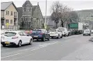  ??  ?? Resurfacin­g works on Burnley Road in Rawtenstal­l have been causing delays