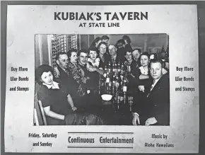  ?? ?? This World War II-era photo taken at Kubiac’s Tavern in Niles Twp. advertises the bar’s “Continuous Entertainm­ent” on weekends by the Aloha Hawaiians and exhorts viewers to “Buy more war bonds and stamps.”