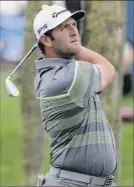  ?? Lynne Sladky / Associated Press ?? Jon Rahm rallied into the lead after trailing by five shots at the start of the third round on Saturday. Rahm shot 8-under to reach 15-under 201.