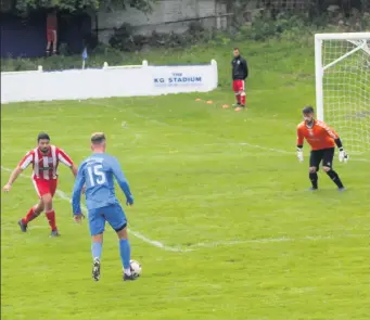  ??  ?? Back at it East Kilbride Thistle (in red) on the defensive against Blantyre Vics on Saturday (Pic: Blake Welsh)