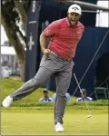  ?? MARCIO JOSE SANCHEZ/AP ?? Jon Rahm watches his putt on the 17th green during the final round of the U.S. Open at Torrey Pines. “... I’m like, ‘Man, that looks really good.’ ”