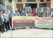  ??  ?? Congress members protest in Meghalaya on Friday over the government formation in Karnataka; (right) ■ Assam Pradesh Congress Committee observe ‘Save Democracy Day’ in Guwahati.