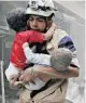  ?? FLIFF/COURTESY ?? Syrian civil defense volunteers known as the White Helmets carry young bombing victims to safety.