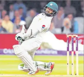  ?? REUTERS ?? Azhar Ali shored up Pakistan’s batting before being dismissed for a patient 50 against England on the second day of the first Test at Lord’s on Friday.