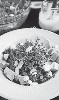  ?? GRETCHEN MCKAY/POST-GAZETTE ?? Garnished with avocado and broccoli microgreen­s, this “ancient” grain bowl is a snap to compose and makes a nutritious breakfast, lunch or dinner.