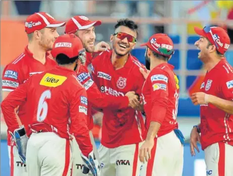  ?? AFP ?? Kings XI Punjab players have come up with stellar performanc­es, but they have also been patchy. They need to find consistenc­y if they hope to make the grade.