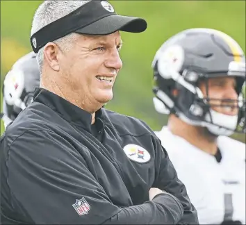  ?? Peter Diana/Post-Gazette ?? Offensive line coach Mike Munchak on his linemen — “Hopefully, each guy I deal with, they feel, ‘Hey, you know what? You made me better. You put me in the best spot to be successful.’”