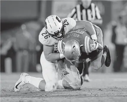  ?? Raul Romero Jr, Daily Camera file ?? Colorado linebacker Carson Wells tackles UCLA running back Joshua Kelley in the backfield during the second half on Nov. 2 at the Rose Bowl in Pasadena, Calif.