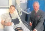  ??  ?? Prince Charles visits Travis Frain who was hit by the terrorist’s 4x4.