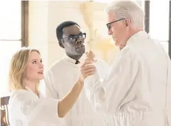  ?? Colleen Hayes NBC ?? CHIDI (William Jackson Harper), center, teaches Eleanor (Kristen Bell) and Michael (Ted Danson) a moral philosophy classic in “The Trolley Problem.”