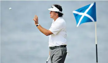  ??  ?? In the hole: Phil Mickelson followed his 2013 Scottish Open win with a triumph at The Open