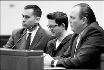  ?? JAKE BACON/ARIZONA DAILY SUN VIA AP, FILE ?? IN THIS APRIL 12, 2016, FILE PHOTO, Steven Jones, middle, weeps as Coconino County Superior Court Judge Dan Slayton announces his decision to amend the conditions of release for Jones in Flagstaff. The former Northern Arizona University student is in jail awaiting his upcoming sentencing in a 2015 shooting that killed a student and three others were wounded.