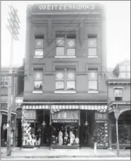  ?? PHOTO COURTESY OF WEITZENKOR­N’S ?? The current location of Weitzenkor­n’s men’s store, circa 1911. The Pottstown store will be closing this spring, relocating to Phoenixvil­le.