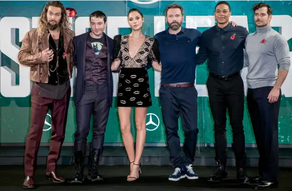  ??  ?? Teaming-up to save the world: Jason Momoa (Aquaman), Ezra Miller (Flash), Gal Gadot (Wonder Woman), Ben Affleck (Batman), Ray Fisher (Cyborg) and Henry Cavill (Superman)