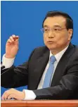  ??  ?? CNBC.COM Primeiro-ministro da China Li Keqiang reconhece riscos