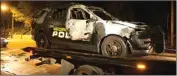 ??  ?? JADI SASARAN: Mobil polisi yang dirusak massa di Atlanta. KEVIN D. LILES/AP PHOTO