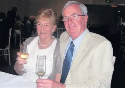  ??  ?? Former World Cup football referee Clive Thomas and wife Beryl have celebrated their diamond wedding anniversar­y