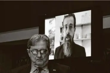  ?? Bill Clark / Getty Images ?? Sen. John Kennedy, R-La., is shown in front of an image of Twitter CEO Jack Dorsey during a Senate Judiciary Committee hearing last week. At the hearing, Sen. Ted Cruz, R-Texas, demanded that Dorsey and Facebook CEO Mark Zuckerberg produce data showing how often they flag or block Republican candidates and elected officials as opposed to Democrats.