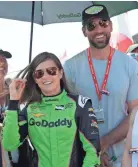  ?? ASSOCIATED PRESS ?? Danica Patrick and boyfriend Aaron Rodgers of the Green Bay Packers await the start of the Indy 500 on Sunday.