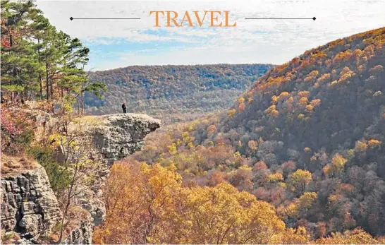  ?? KATHERINE RODEGHIER/CHICAGO TRIBUNE PHOTOS ?? Hawksbill Crag, one of the most photograph­ed spots in Arkansas, is on the Whitaker Point Trail.