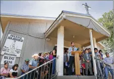  ?? AMERICANST­ATESMAN FILE ?? Bastrop Interfaith leaders held a press conference in the Stony Point community of Del Valle on July 2 to protest zero tolerance traffic arrests ordered by the county’s sheriff.