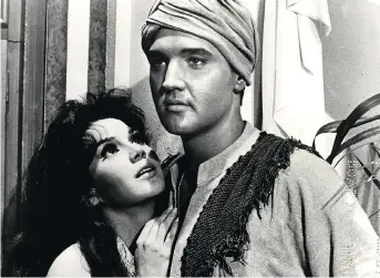  ?? MGM ?? Mary Ann Mobley and Elvis Presley starred in Harum Scarum — one of the King’s many forgettabl­e movies.