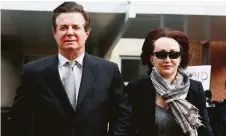  ?? Jacquelyn Martin / Associated Press ?? Paul Manafort, accompanie­d by his wife Kathleen, has been ordered to home confinemen­t as he awaits a July trial in Virginia.