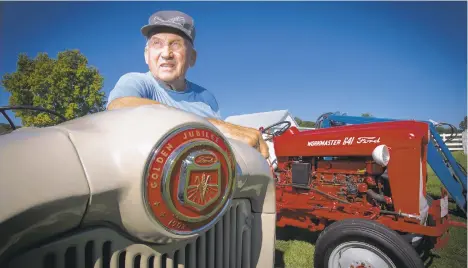  ?? PHOTOS BY RICK KINTZEL/THE MORNING CALL ?? Donald Wehr stands next to one of his several vintage tractors Wednesday at his home in Orefield. This October, Donald and his wife, Miriam, will auction off their home and his prized possession­s.