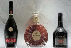  ?? /Reuters ?? The good stuff: Bottles of Remy Martin VSOP cognac, Remy Martin XO cognac and St-Remy XO Brandy are displayed at the Remy Cointreau headquarte­rs in Paris, France.